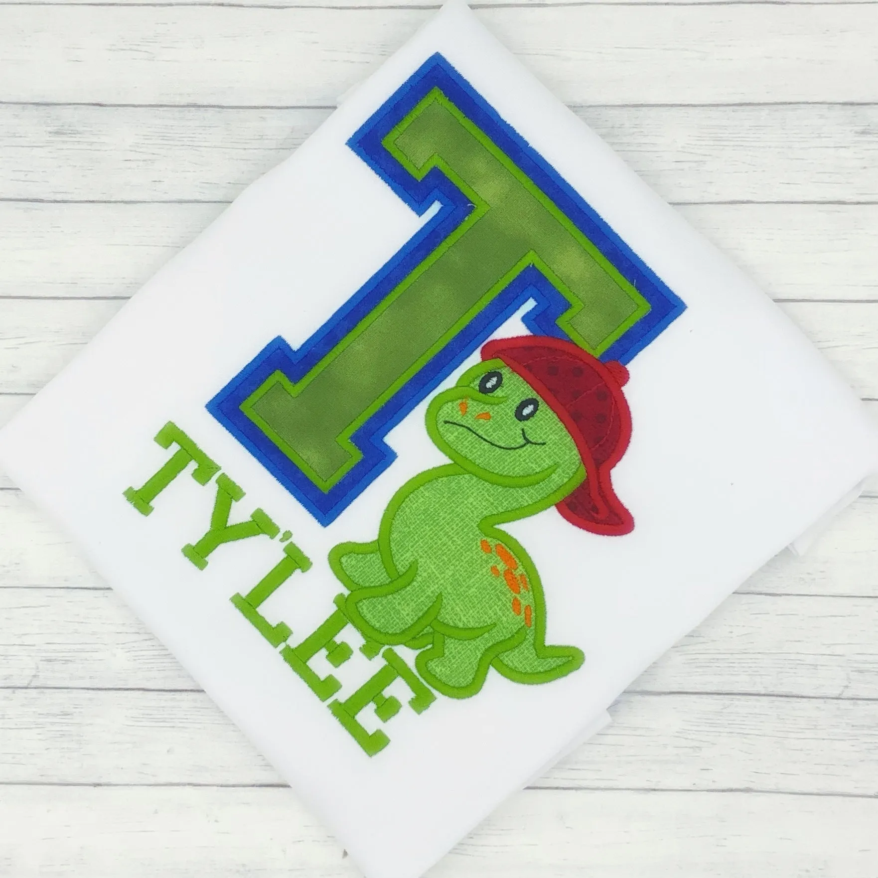 Dinosaur w/ Hat - Varsity Name Shirt