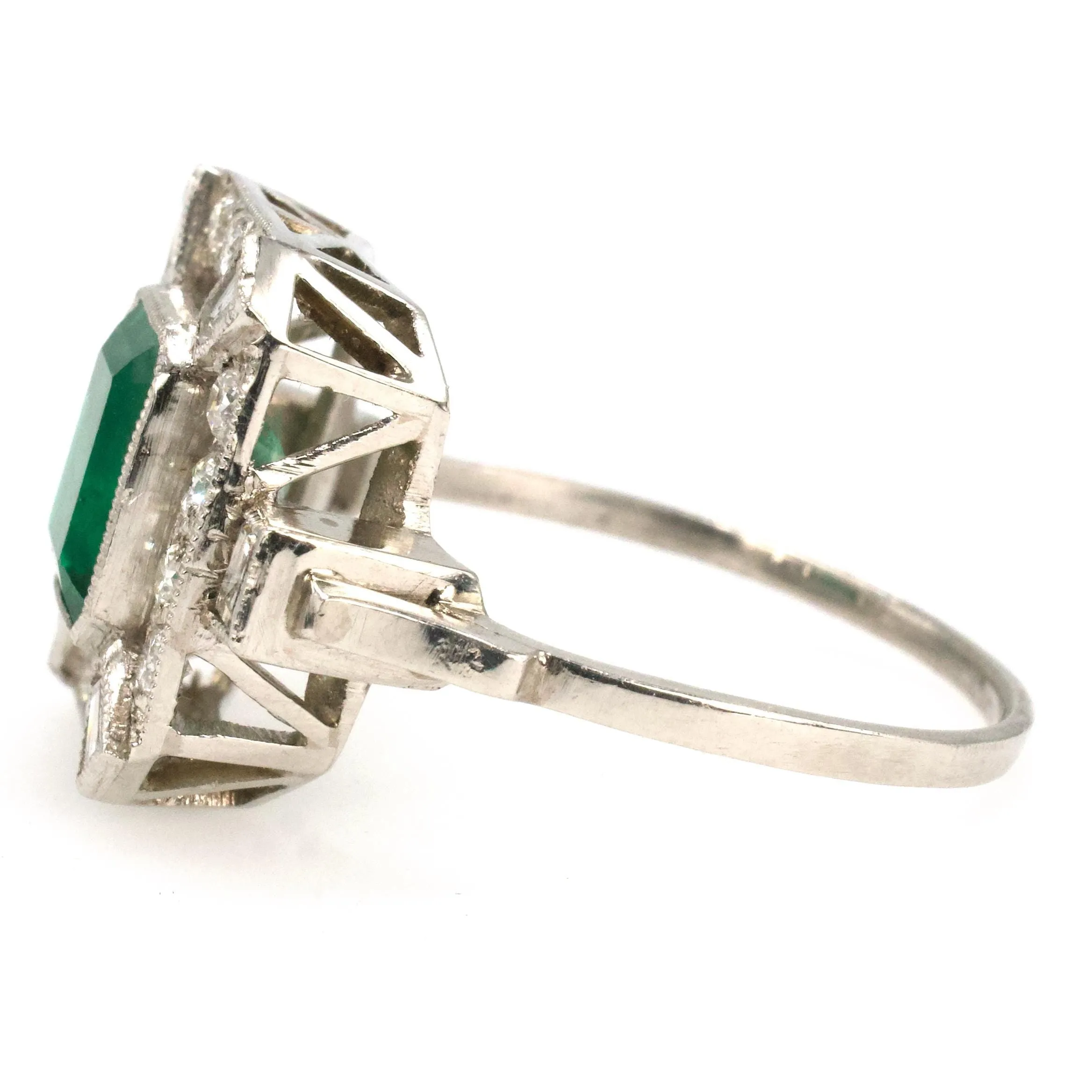 Estate 1.40 Carat Emerald Cut Emerald in Art Deco Style White Gold Setting with Diamond Halo