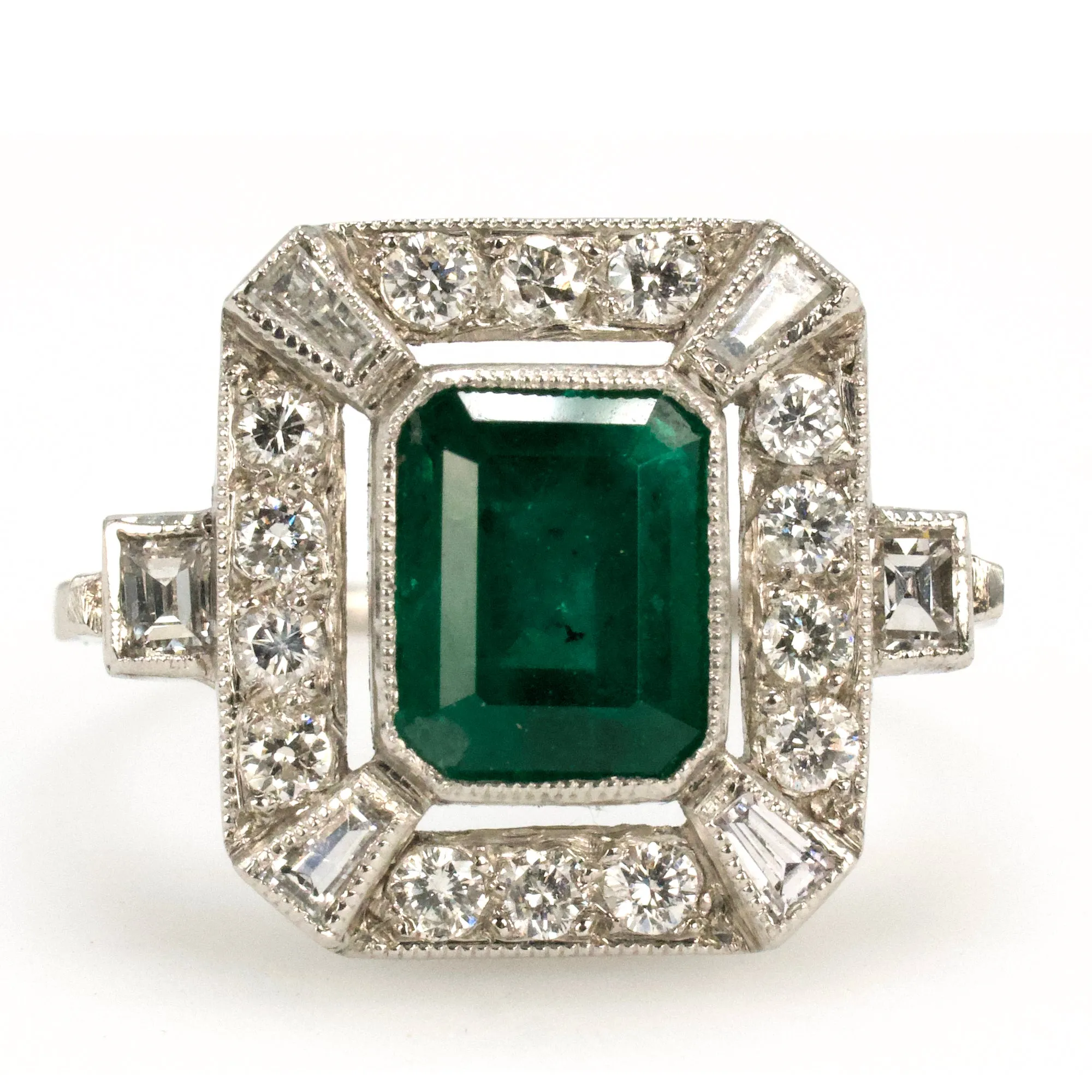 Estate 1.40 Carat Emerald Cut Emerald in Art Deco Style White Gold Setting with Diamond Halo